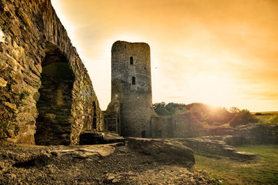 Old ruin building against sky during sunset