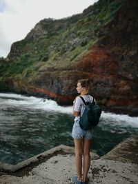 Young woman looking at sea