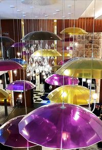 Illuminated lighting equipment in restaurant at night