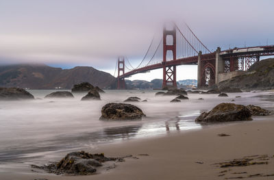 View of suspension bridge over river