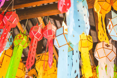 Low angle view of colorful lanterns for sale at market
