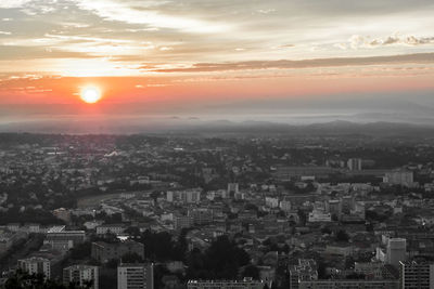 High angle view of townscape against sky at sunset