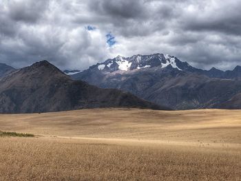 Scenic view of landscape and mountains against sky