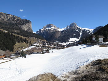 Scenic view of snowcapped mountains against clear sky