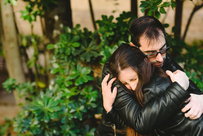 Portrait of young couple in outdoors