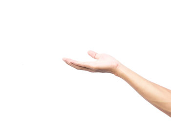 Close-up of hands over white background