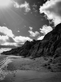 Scenic view of beach against sky