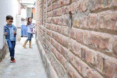 People walking on cobblestone