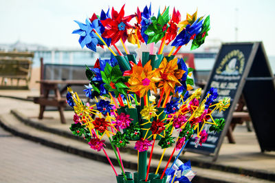 Colorful pinwheel toys on street for sale
