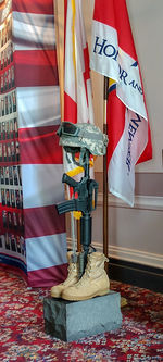 Close-up of flags hanging on table