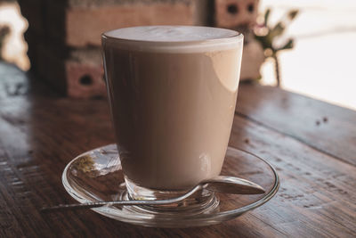 Close-up of coffee cup on table