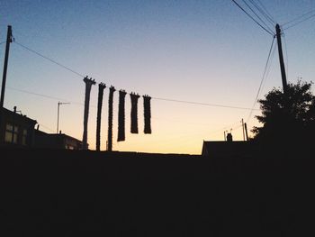 Low angle view of built structure at sunset