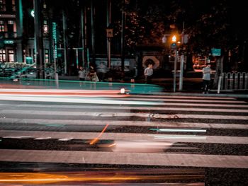 Light trails on city street at night