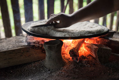 Low section of person legs on wood