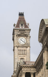 The clock tower of the museum and art gallery in the city of birmingham, uk