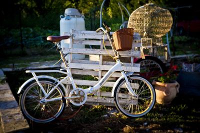 Bicycle in basket on field