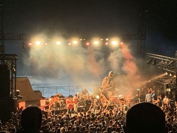 Panoramic view of crowd at music concert