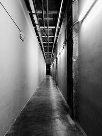 Illuminated corridor of building