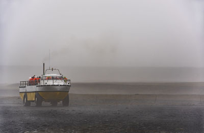 Amphibious vehicle taking tourist to the glacier lagoon jokulsarlon