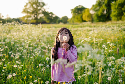 Full length of girl standing on land