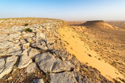 Scenic view of desert against sky