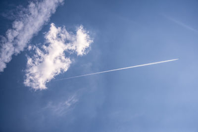 Low angle view of vapor trail in sky