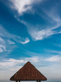 Low angle view of roof against sky