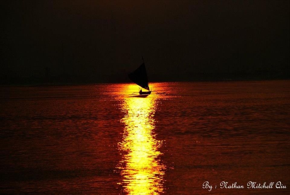 flying, transportation, mid-air, waterfront, water, mode of transport, tranquility, nature, sea, sunset, on the move, nautical vessel, outdoors, scenics, silhouette, travel, beauty in nature, tranquil scene, bird, rippled