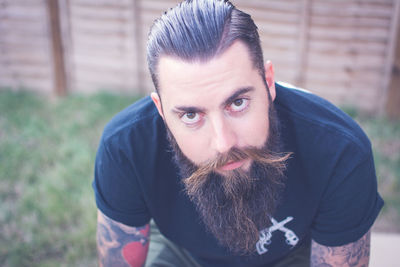 Portrait of bearded man with tattoos