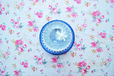 High angle view of white flower in water on table