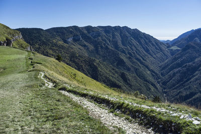 Hiking trail in the italian mountain. the folgaria high italian plateau for trekking and relaxation