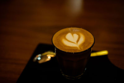 Close-up of cappuccino on table