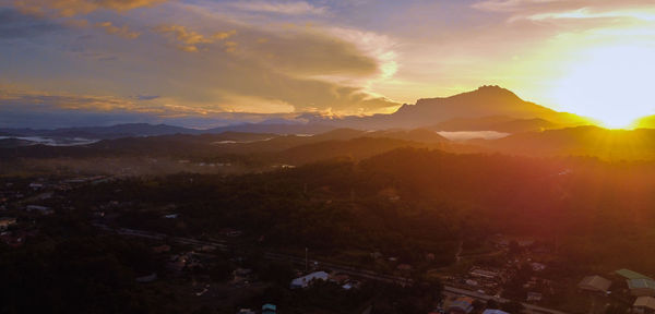 Scenic view of mountains against sky during sunset