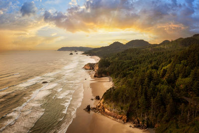 Cannon beach, oregon. aerial view of the cannon beach area with haystack rock in the distance.