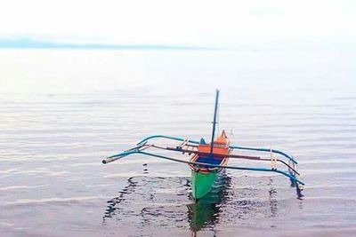 Boats in calm sea