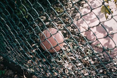 Close-up high angle view of chainlink fence