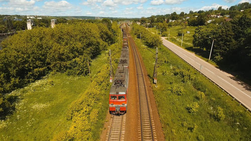 Freight train with cisterns and containers on the railway. aerial view container freight train, 