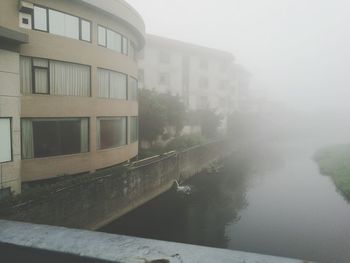 View of city in foggy weather