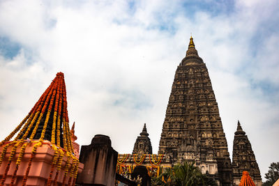 Buddhist stupas isolated with bright sky and unique prospective