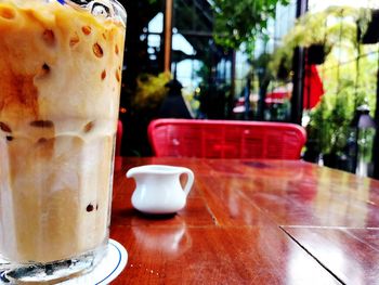 Close-up of coffee cup on table