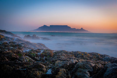 Scenic view of sea against sky during sunset