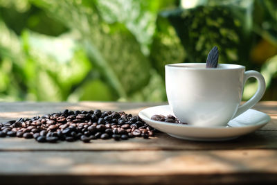 Close-up of coffee cup on table