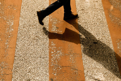 High angle view of shadow on sand