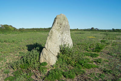 Scenic view of land against clear sky