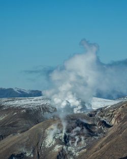 Smoke emitting from mount tongariro against sky