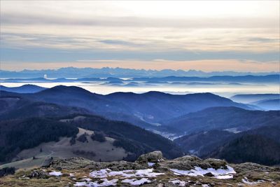 Scenic view of mountains against sky during sunset