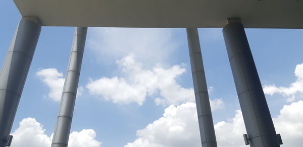 Low angle view of smoke stack against sky