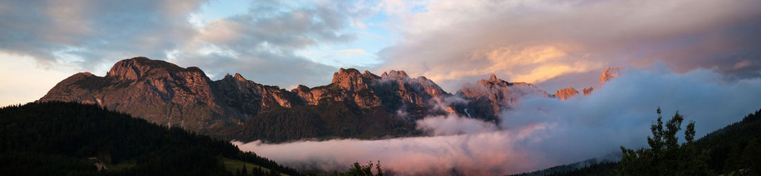 Panoramic view of mountains against sky during sunset