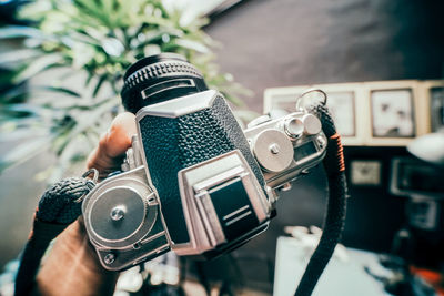 Close-up of hand holding camera