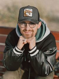 Portrait of young man wearing hat